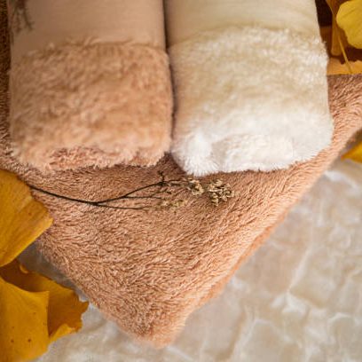 Soft bath towel on white background. Copy space. Mockup for design.